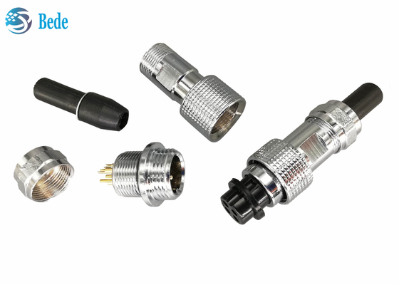 A tomada impermeável do conector da montagem de painel IP67 GX12 ajustou-se fêmea e o homem 2~7pin 3A 200V